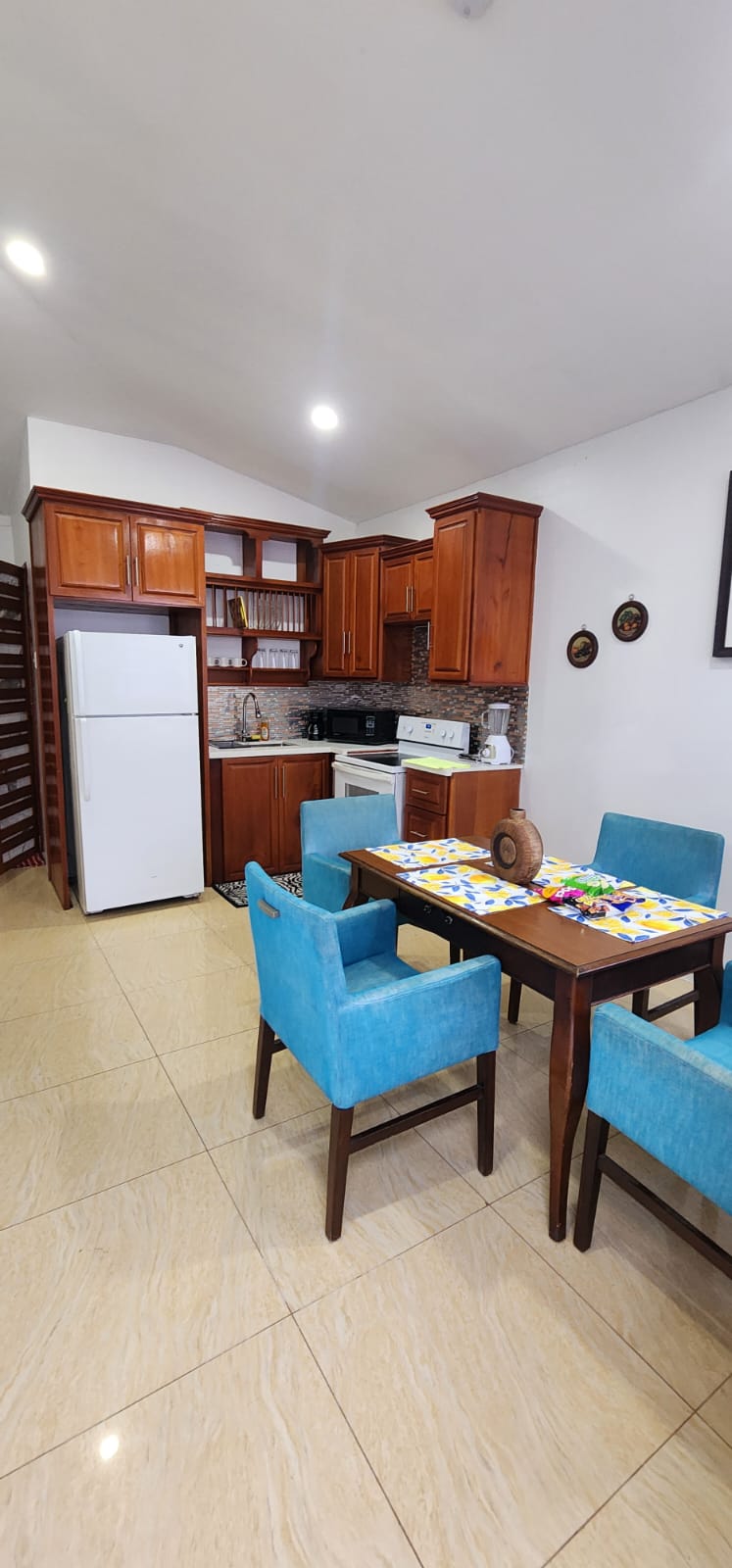 Kitchen and dining area with refrigerator